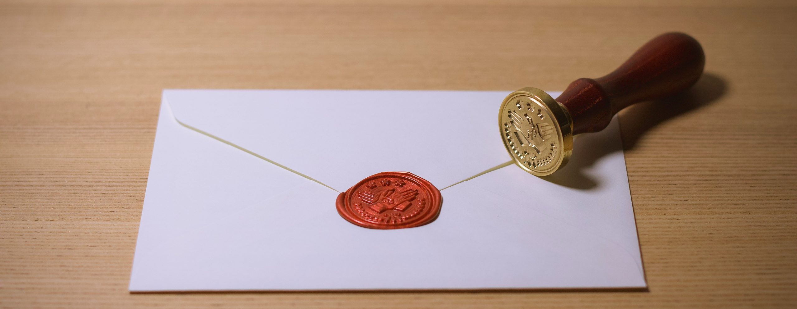 A closed envelope sealed with wax. Indicating something that it to be kept private and secure until the time that it is needed.